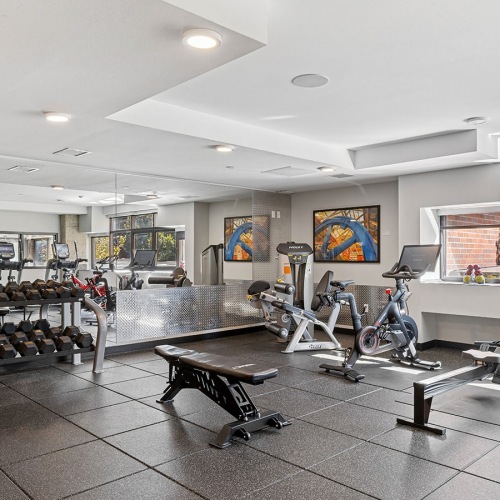 Explore All of Your Goals at the 24/7 Fitness Center Smith & Burns Seattle apartments with on-site fitness center